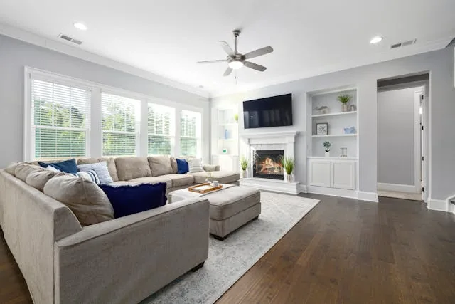 living room with large L shaped couch